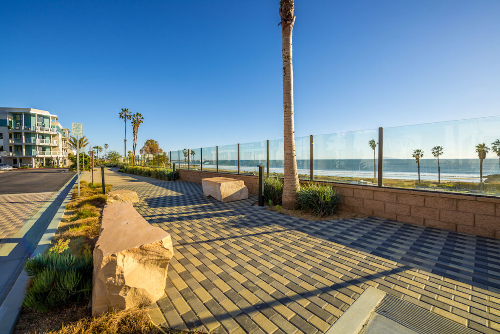 Brick walkway alongside the community with ocean views